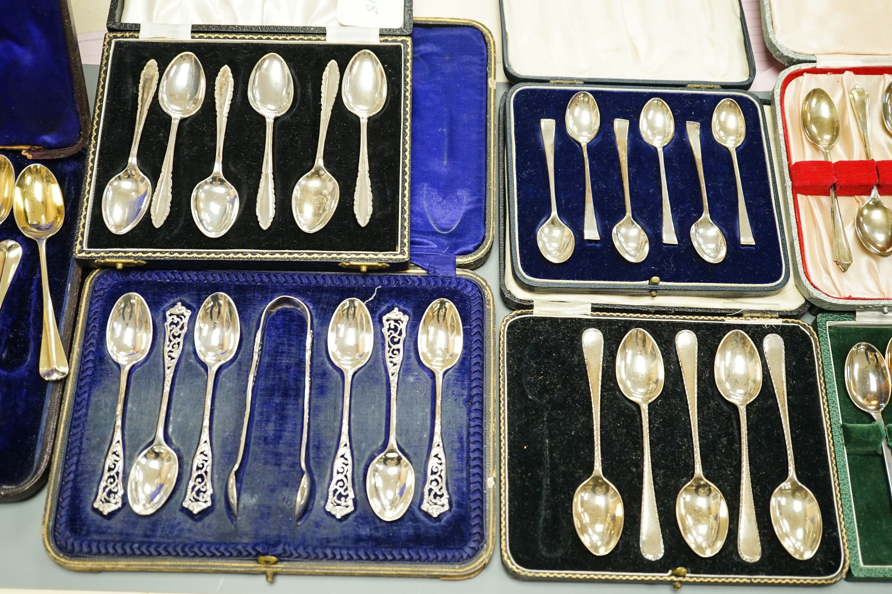 Seven assorted cased sets of English silver tea and coffee spoons, including a set of twelve silver gilt teaspoons, London, 1882 (one set incomplete).